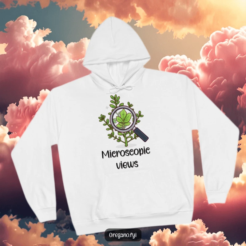 Funny hoodie depicting an oregano sprig with a magnifying glass, meticulously inspecting a single leaf with intense focus.