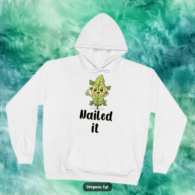 Funny hoodie showcasing an oregano leaf with tiny arms giving a thumbs up, offering warmth and herb-themed positivity. Comfortable and encouraging.