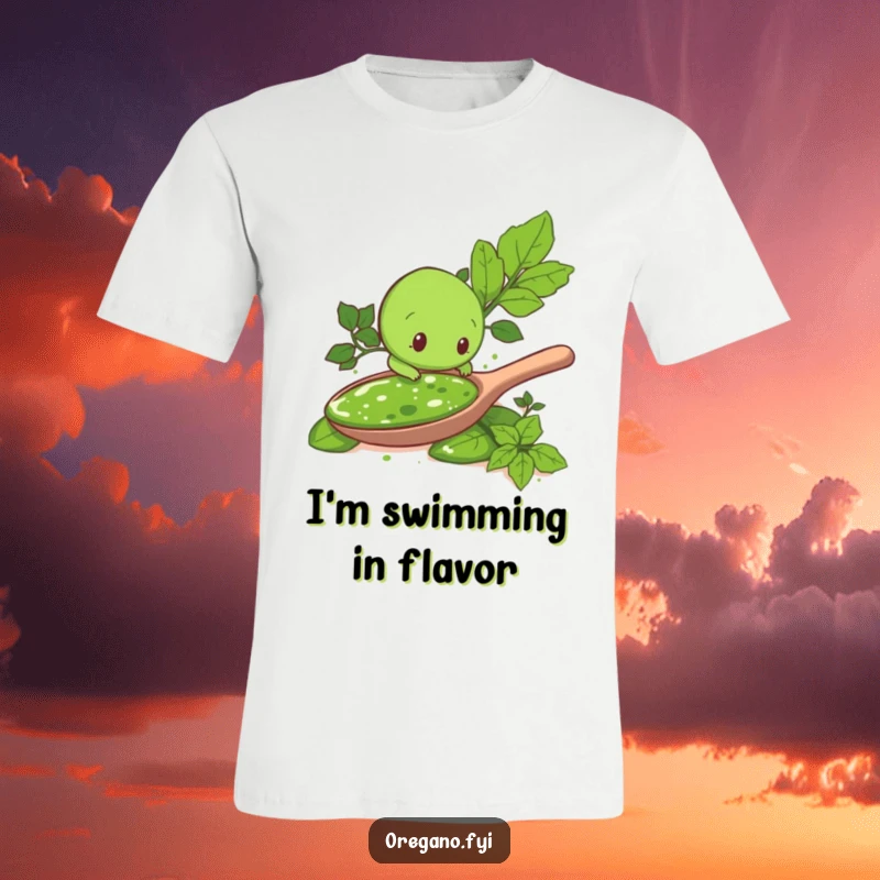 Funny t-shirt graphic: An oregano leaf character humorously dives headfirst into a gigantic spoonful of vibrant green pesto sauce, ready for flavor.