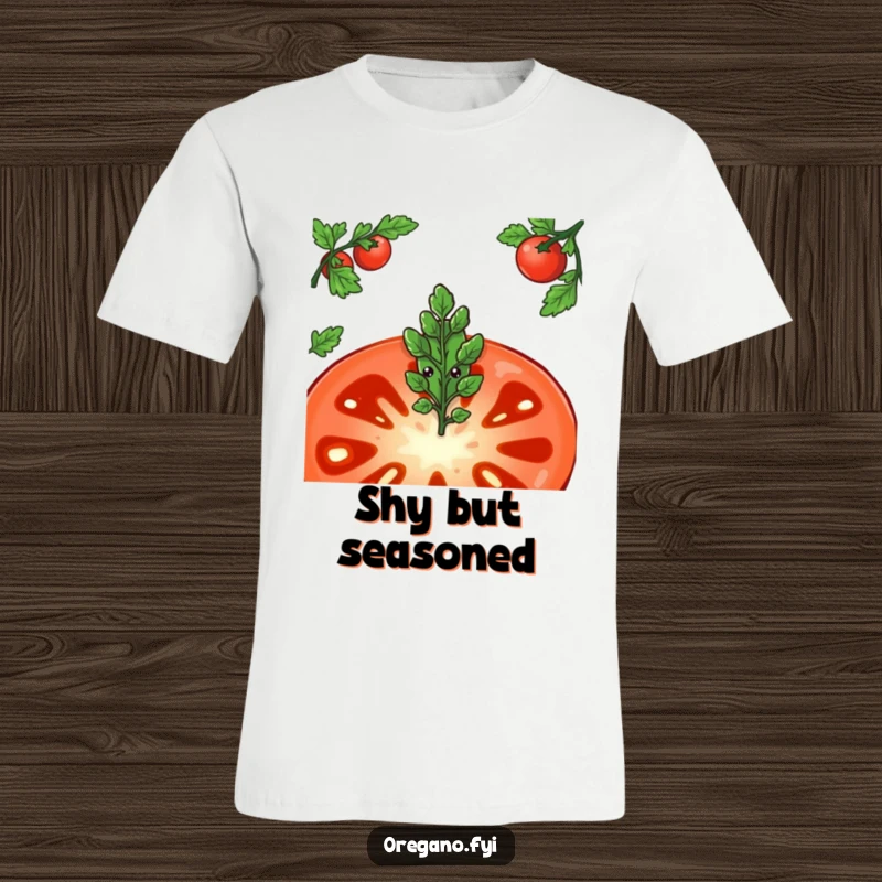 Funny t-shirt depicting a bashful oregano leaf character peeking cautiously from behind a large, juicy tomato slice, full of shyness.